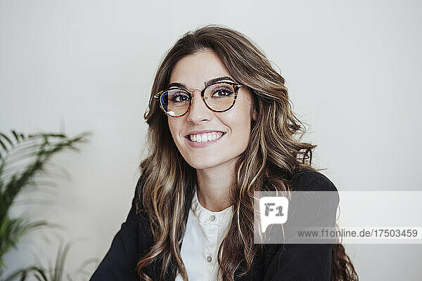 Businesswoman with eyeglasses at office