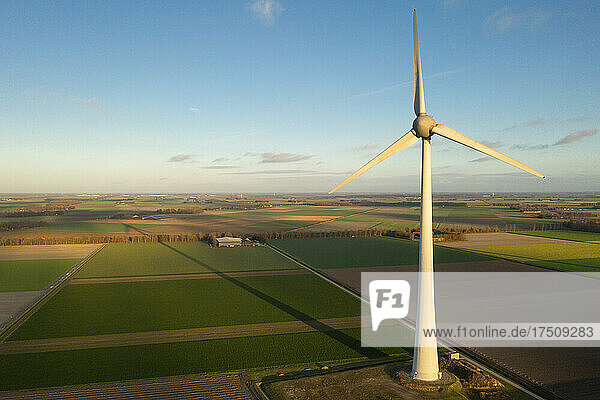 Wind turbine in green fields