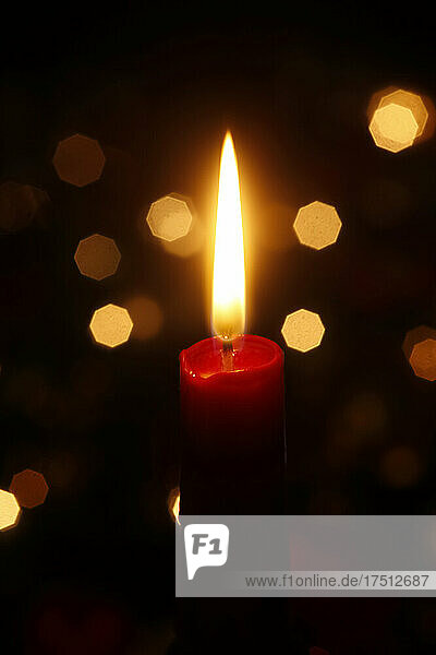 Close up of burning Christmas candle