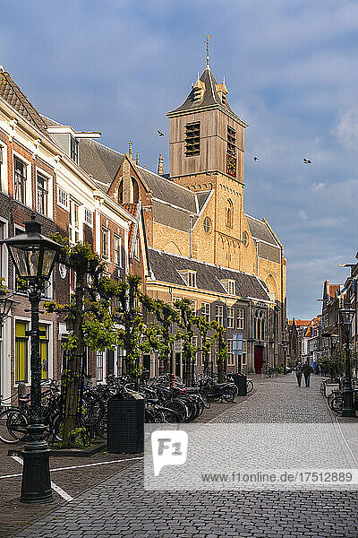 Netherlands  South Holland  Leiden  Cobblestone street in front of Hooglandse Kerk cathedral
