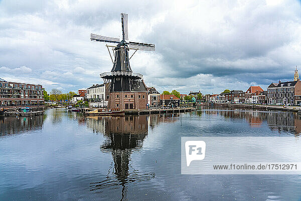 Netherlands  North Holland  Haarlem  Spaarne river canal and De Adriaan windmill