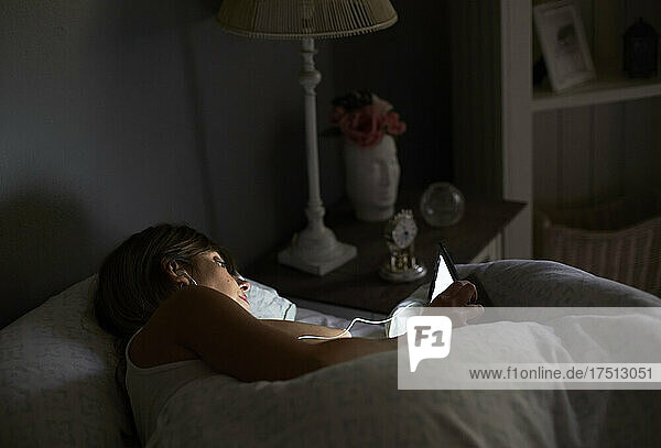 Woman watching a movie on her tablet. Pretoria  South Africa.