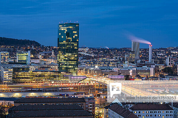Switzerland  Zurich  Cityscape with Prime Tower and Hard Bridge illuminated at night