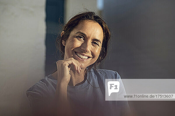 Portrait of a pretty  dark-haired woman  smiling