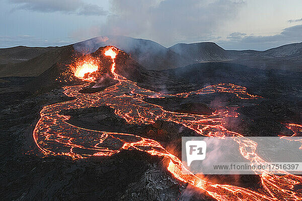 incandescent flowing volcanic lava in cenital view