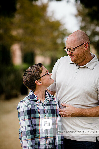Close Up of Father & Son Smiling at One Another in San Diego