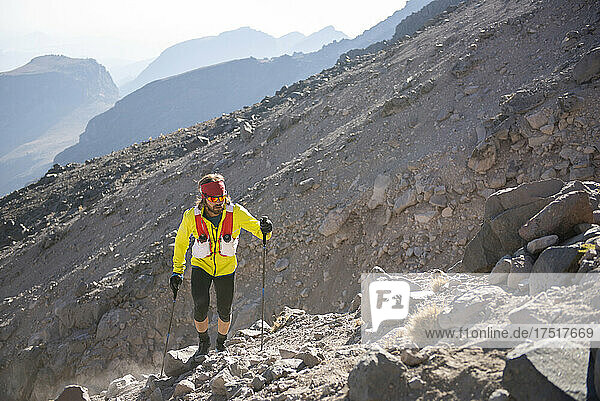 One man climbing Pico de Orizaba on a rocky terrain