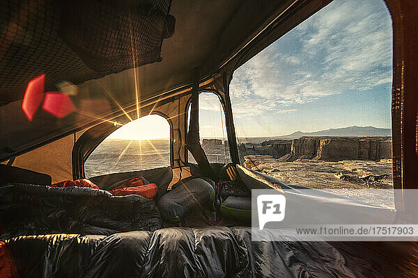 Rooftop tent overlooking desert canyon