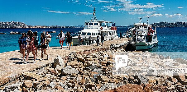 Boats and tourists on a small island tour in the Tyrrhenian Sea  Sardinia  Italy  Europe