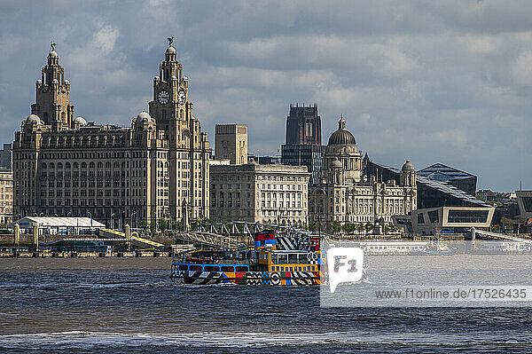 The Mersey Ferry sailing in front of the Liverpool Waterfront  Liverpool  Merseyside  England  United Kingdom  Europe