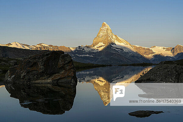 Matterhorn mountain with reflection on lake Stellisee at sunrise  Zermatt  Switzerland
