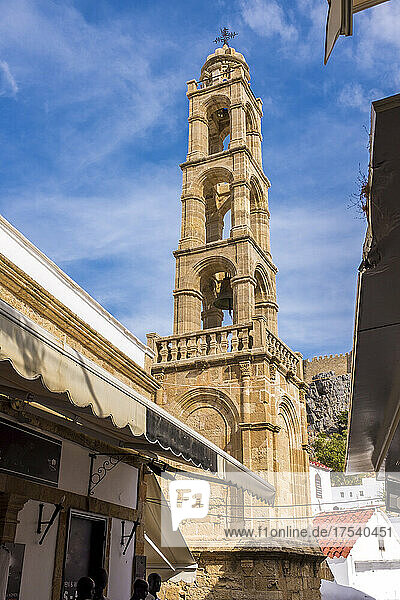 Bell tower of Church of the Holy Virgin in Lindos on sunny day  Rhodes  Greece