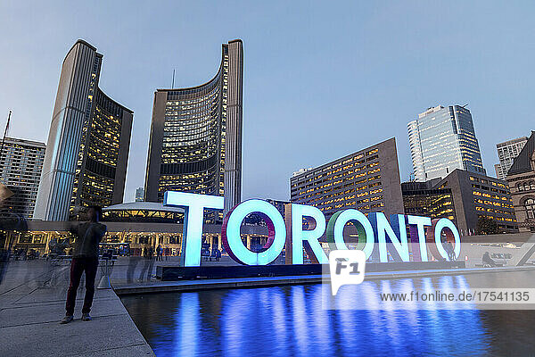 Canada  Ontario  Toronto  Long exposure of 3D Toronto Sign in Nathan Phillips Square at dusk