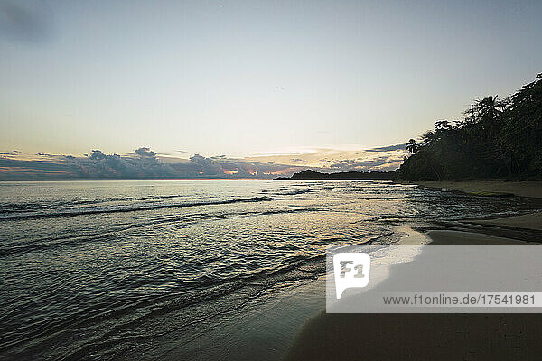 Empty beach at sunset in Limon  Costa Rica
