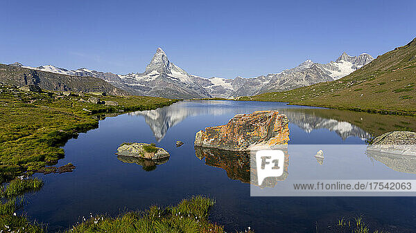 Stellisee lake and Matterhorn mountain on sunny day  Zermatt  Switzerland