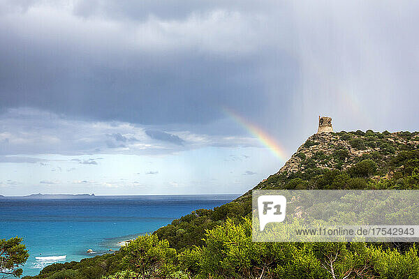 Italy  Province of South Sardinia  Villasimius  Double rainbow over Torre di Porto Giunco