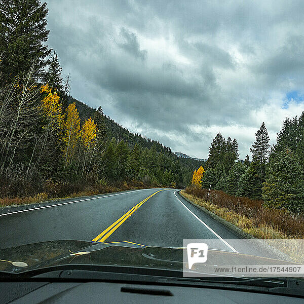USA  Idaho  Ketchum  Highway in mountain landscape in Autumn seen from car