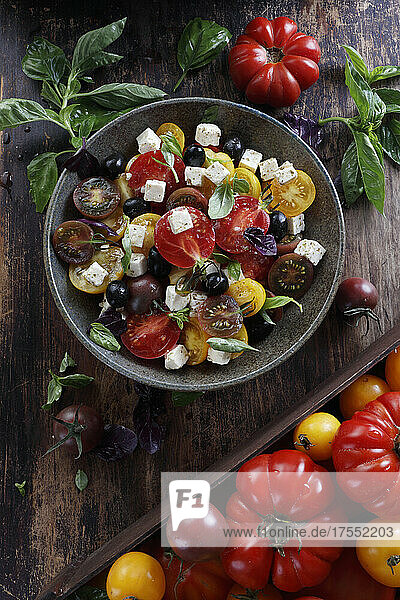Multi-colored tomato salad with feta cheese