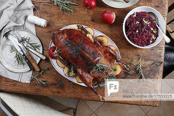 Roasted goose with apples and red cabbage