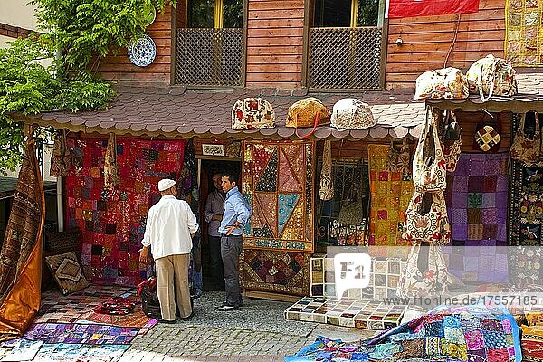 Bazaar Street with carpet dealers  Istanbul  Turkey  Asia