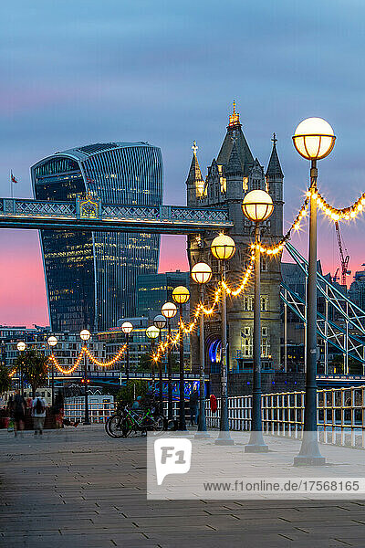 Tower Bridge and the Walkie Talkie building (20 Fenchurch Street) at sunset  from Shad Thames  London  England  United Kingdom