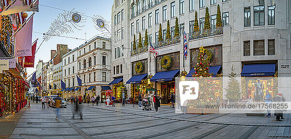 Blick auf Weihnachtsschmuck  Weihnachtsbaum und Geschäfte in der New Bond Street zu Weihnachten  London  England  Vereinigtes Königreich  Europa