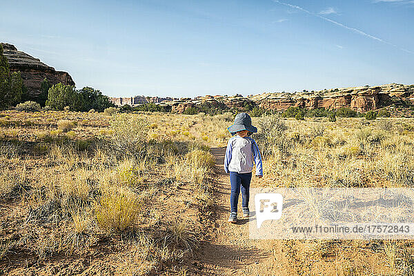 Girl hiking in Canyonlands National Park  Utah