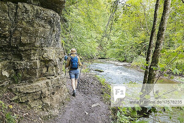 Hiker on the Wutach  shell limestone wall in the Wutach Gorge  Southern Black Forest  Baden-Württemberg  Germany  Europe