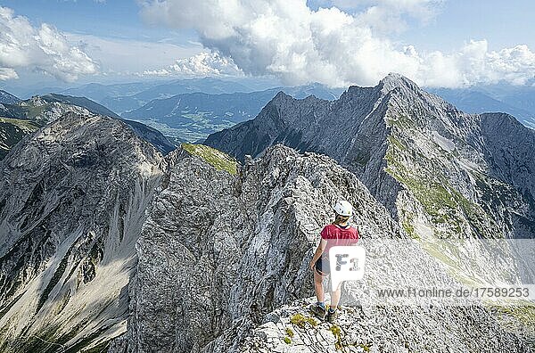 Hikers at the summit of the Lamsenspitze  mountain landscape in the Karwendel Mountains  Tyrol  Austria  Europe