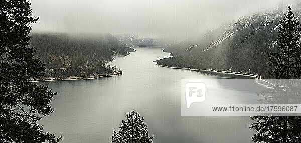 Lake Plansee in foggy weather seen from Tauernberg  Reutte  Tyrol  Austria
