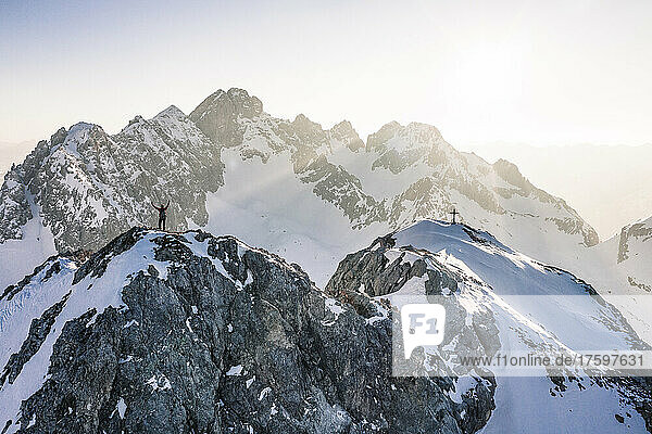 Mountaineer standing on top of Vorderer Tajakopf mountain  Ehrwald  Tirol  Austria