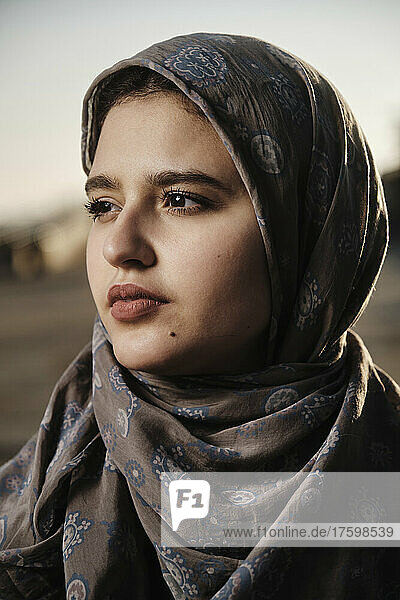 Thoughtful young woman wearing hijab