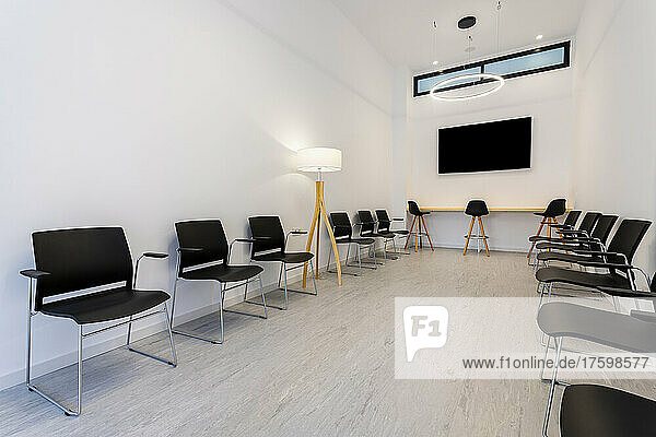 Chairs arranged at modern medical clinic