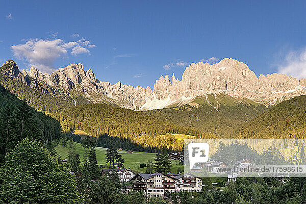 Italy  South Tyrol  Scenic view of Rosengartenspitze and Vajolet Towers in Fassa Valley at early dusk