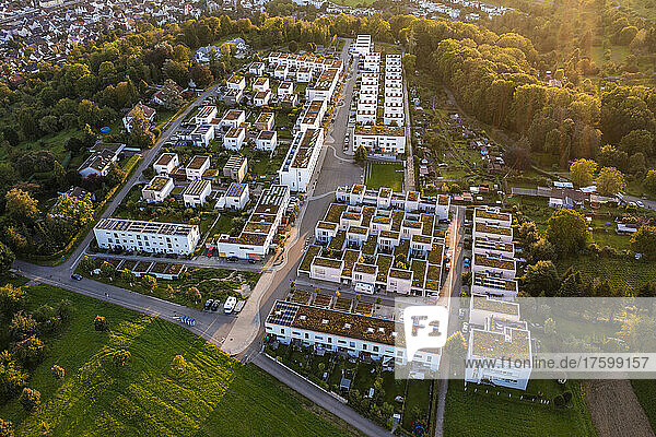 Germany  Baden-Wurttemberg  Esslingen am Neckar  Aerial view of new development area Sonnensiedlung Egert at dusk