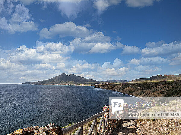Spain  Province of Almeria  Isleta del Moro  Coastal footpath in Cabo de Gata with mountains in background