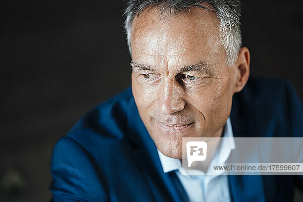 Thoughtful mature businessman in office