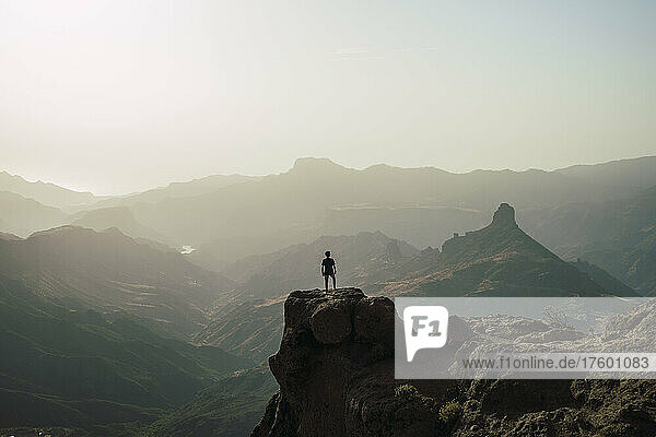 Hiker standing on mountain peak  Grand Canary  Spain