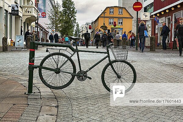 Entrance to the pedestrian zone Göngugötur  bicycle as barrier  no entry  Reykjavik  Iceland  Europe