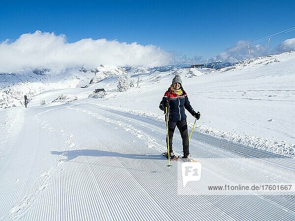 Winter landscape  snowshoe hiker on her way to the Lawinenstein  Tauplitzalm  Styria  Austria  Europe