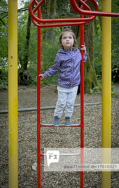 Preschool girl at a playground; North Vancouver  British Columbia  Canada