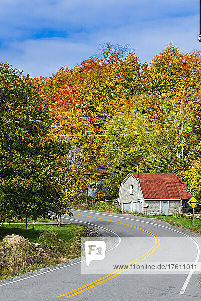 Country road in autumn in the municipality of Mille-Isles  Laurentides of Quebec  Canada; Quebec  Canada