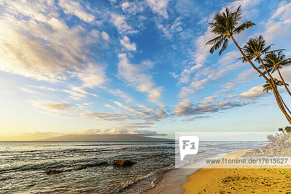 View from Ka'anapali Beach at sunset with the Island of Molokai on the horizon; Ka'anapali  Maui  Hawaii  United States of America