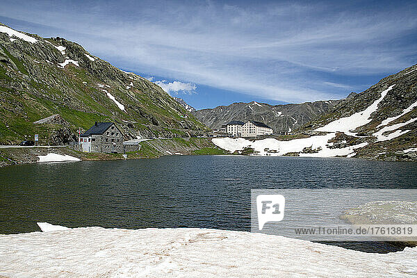 Lake and housing at the San Bernardino Pass  a high mountain pass in the Swiss Alps; Switzerland