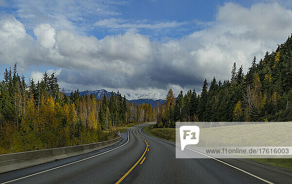 Driving East from Terrace  BC on Highway 16 (Yellowhead Highway) through BC  Canada in autumn; British Columbia  Canada