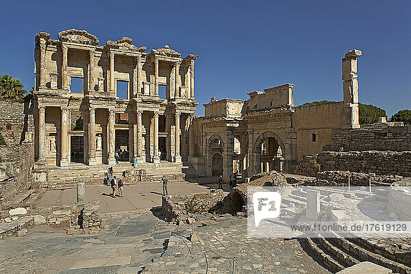 The Library of Celsus  with the Gate of Augustus on the right  in Ephesus  Turkey; Ephesus  Anatolia  Turkey