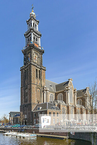 The Westerkerk and a canal in Amsterdam; Amsterdam  North Holland  Netherlands