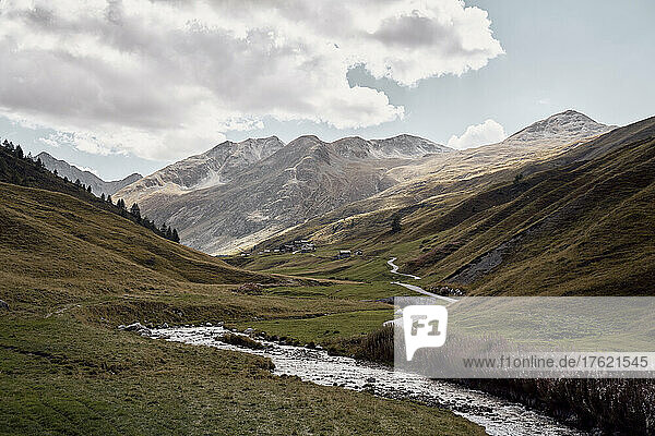 River flowing in stream amidst mountains  Foscagno Pass  Valtellina  Bormio  Italy