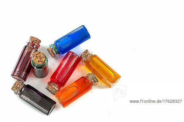 Bottles of food coloring isolated on white background