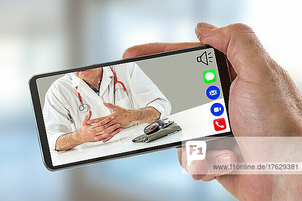 Hand of a man holding Smartphone  mobile phone with calling icon in here phone  song camera and messaging and live chat ith doctor on screen on white backgroud